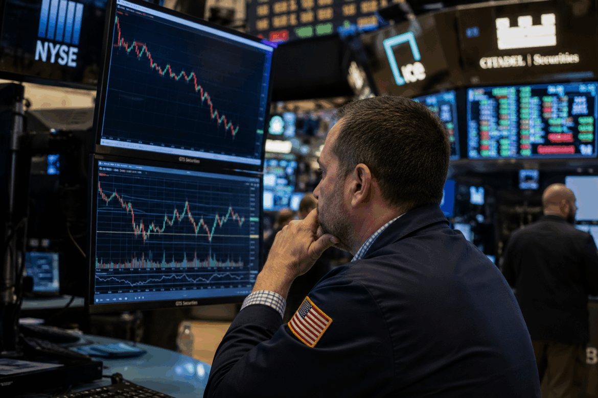 An investor looking at stock market charts